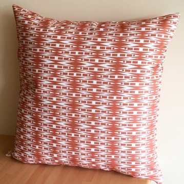Aztec cushion in coral from HemLiv